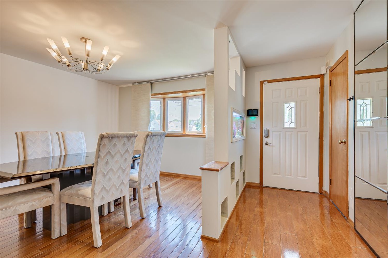 A bright arrival with hardwood floors