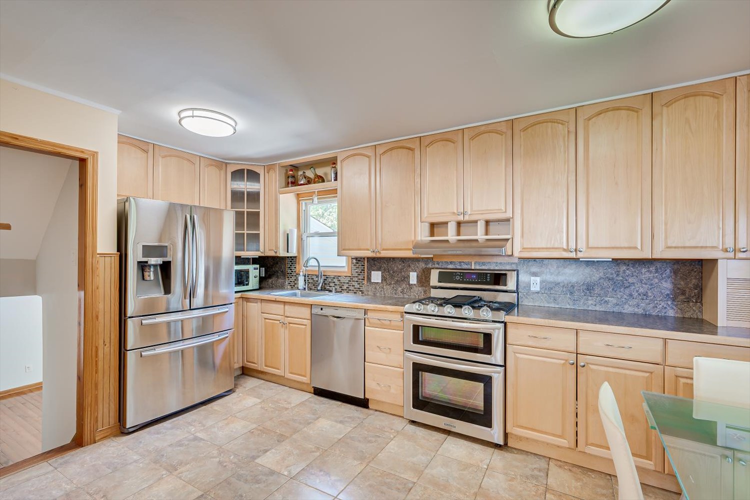 Stainless steel appliances and practical prep space
